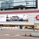 Illustration for article titled BMW Slaps Audi Dealership With Giant Billboard